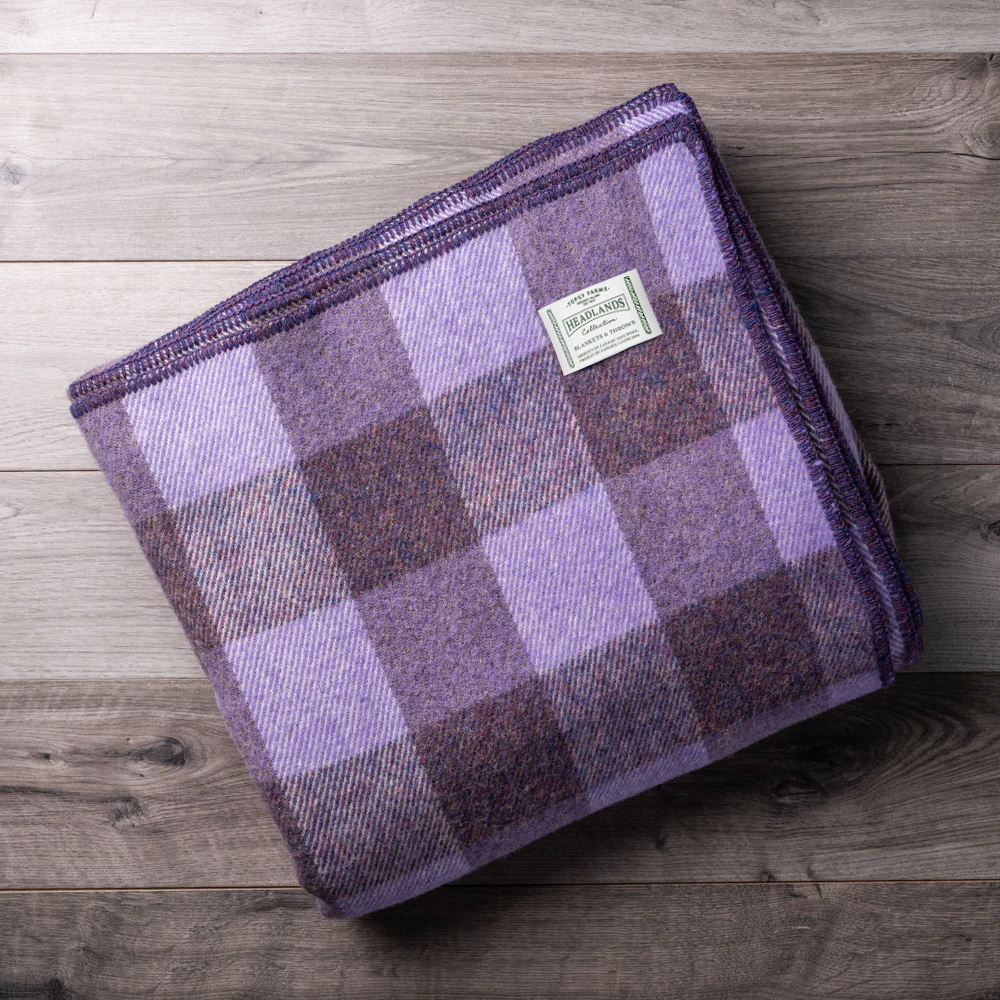 Topsy Farms' mauve and purple wool blanket