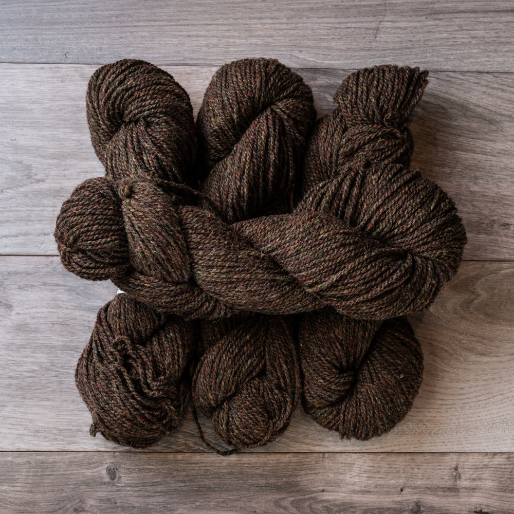 Brown Heather skeins of yarn.