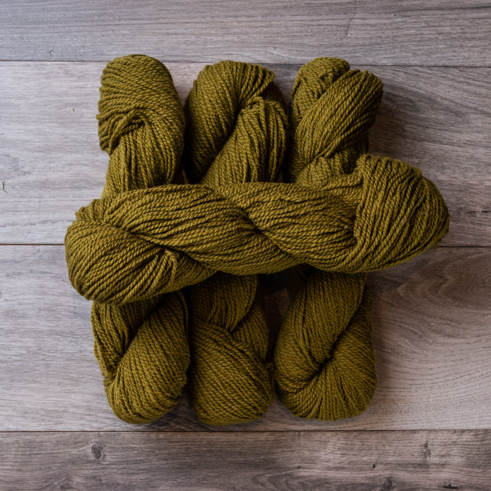 Green Olive skeins of yarn.