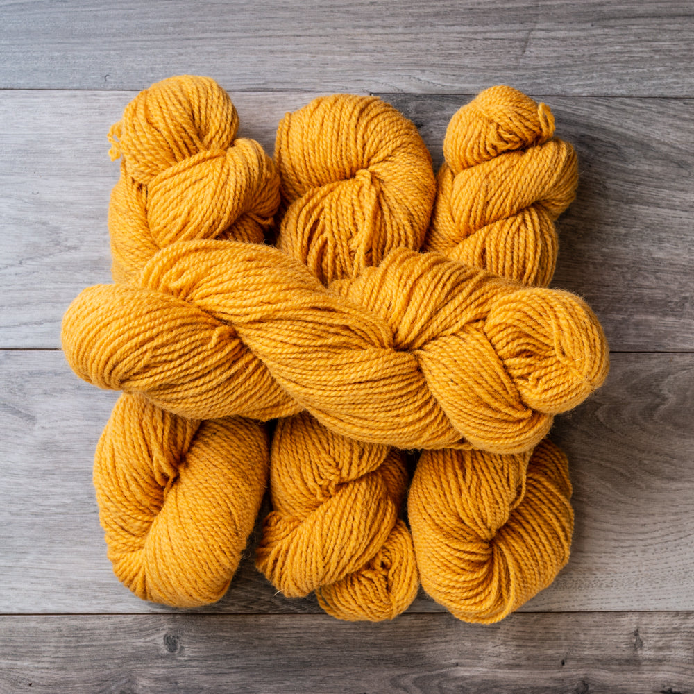 Sunflower Gold skeins of yarn.