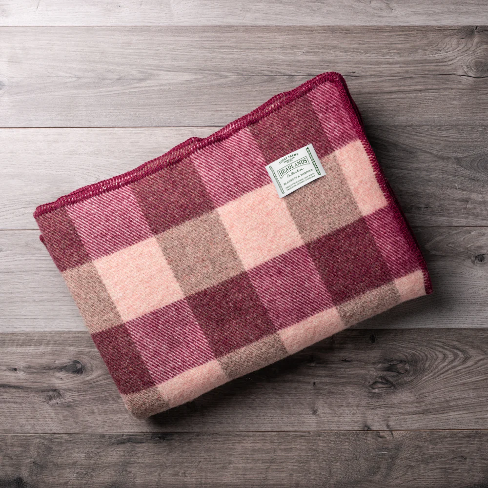 Topsy Farms' burgundy and pink wool blanket