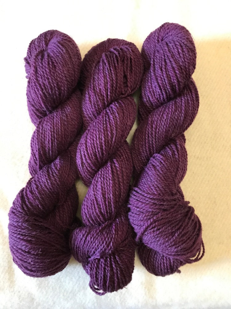 Topsy Farms' royal purple wool yarn