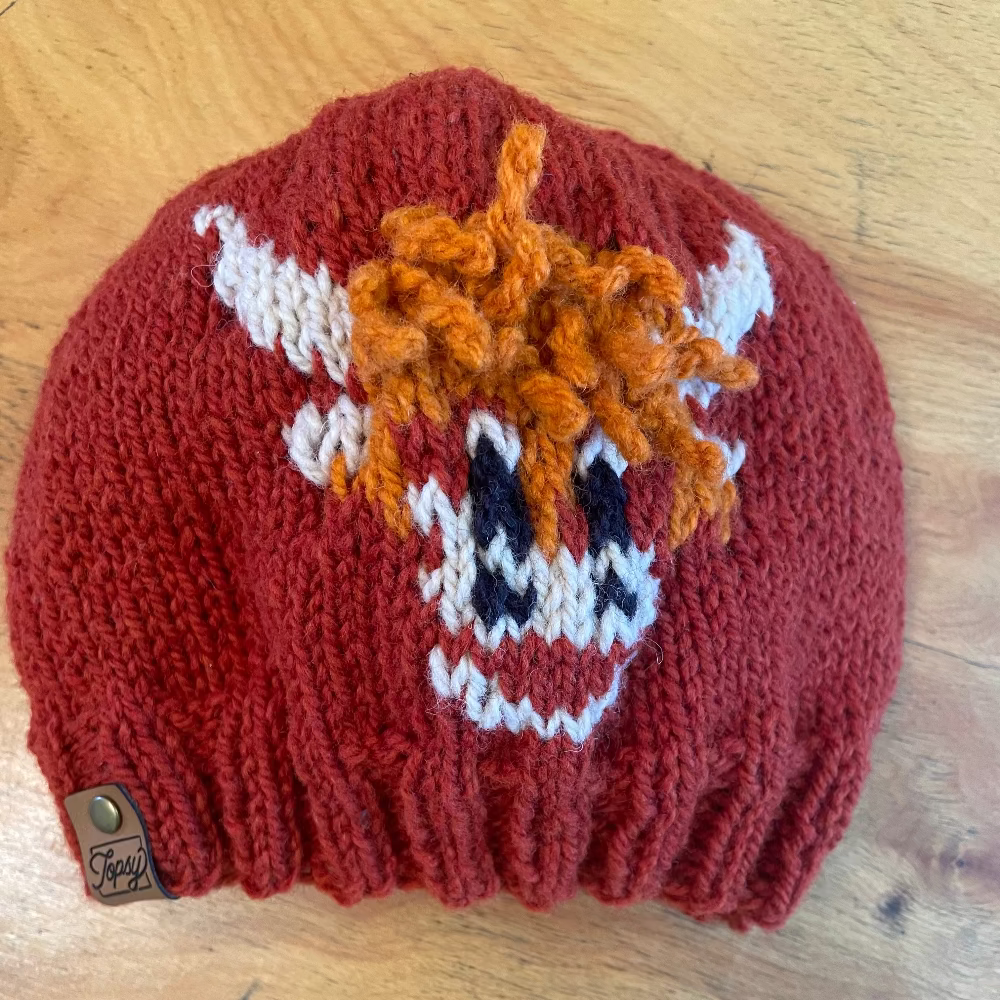 Topsy Farms' handmade highland cow wool hat