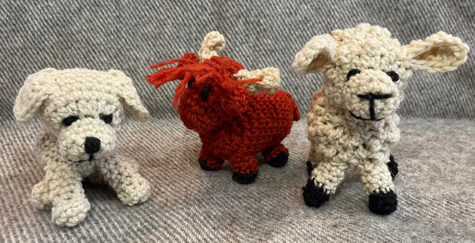 Topsy Farms' handmade wool sheep, highland cow, and guardian dog