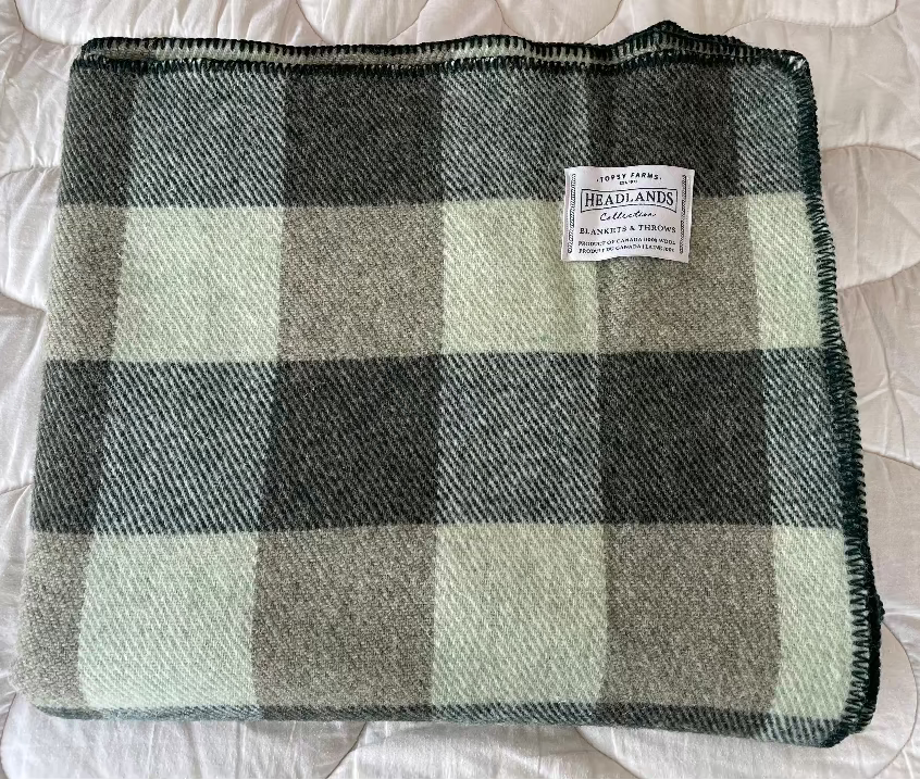 Topsy Farms' Canadian wool forest and light green checkerboard blanket