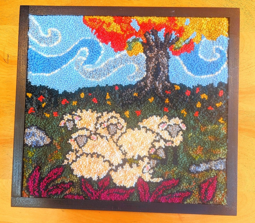 Topsy Farms' handmade wool wall hanging of sheep in a field under a tree