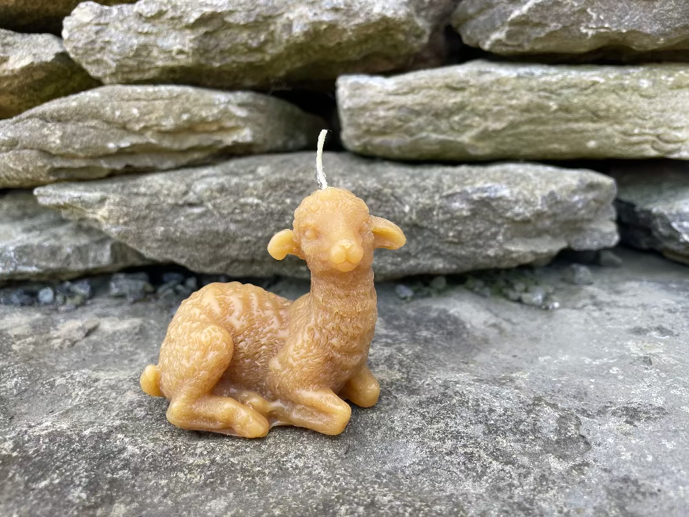 Topsy Farms' handmade beeswax candle in the shape of a lamb