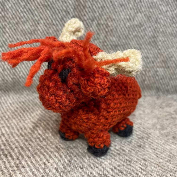 Topsy Farms' handmade wool highland cow