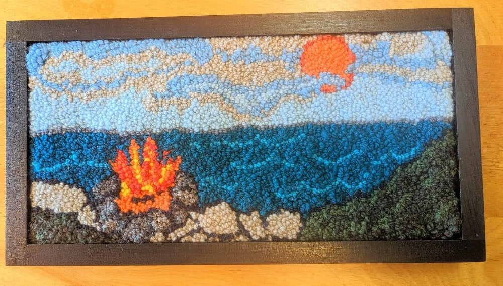 Topsy Farms' handmade wool wall hanging of a bonfire by a lake