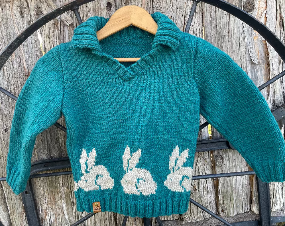 Topsy Farms' handmade Canadian wool sweater in teal with bunnies