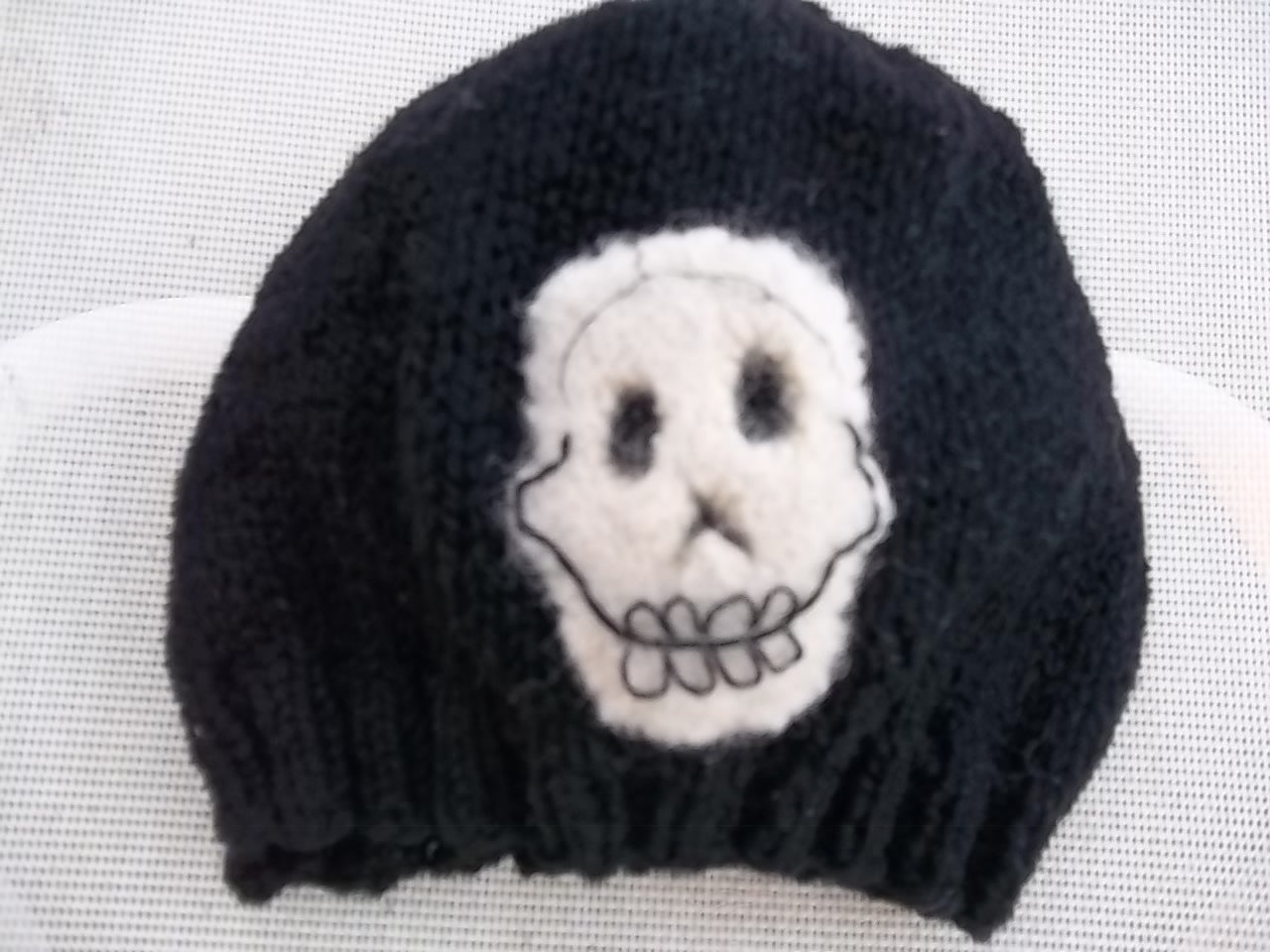 Topsy Farms' wool hat with skull applique