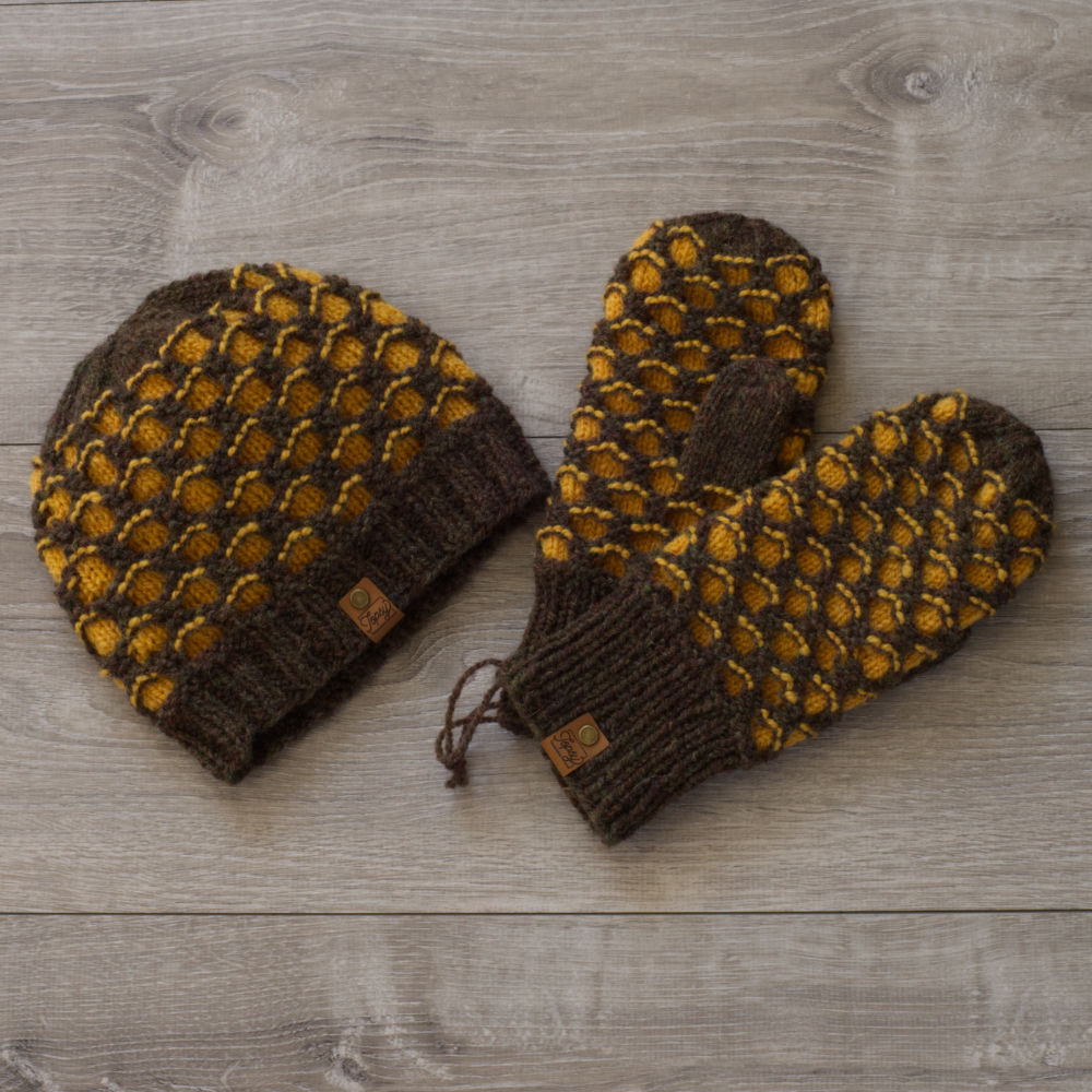 Knitted brown and gold toque and mittens in a honeycomb pattern