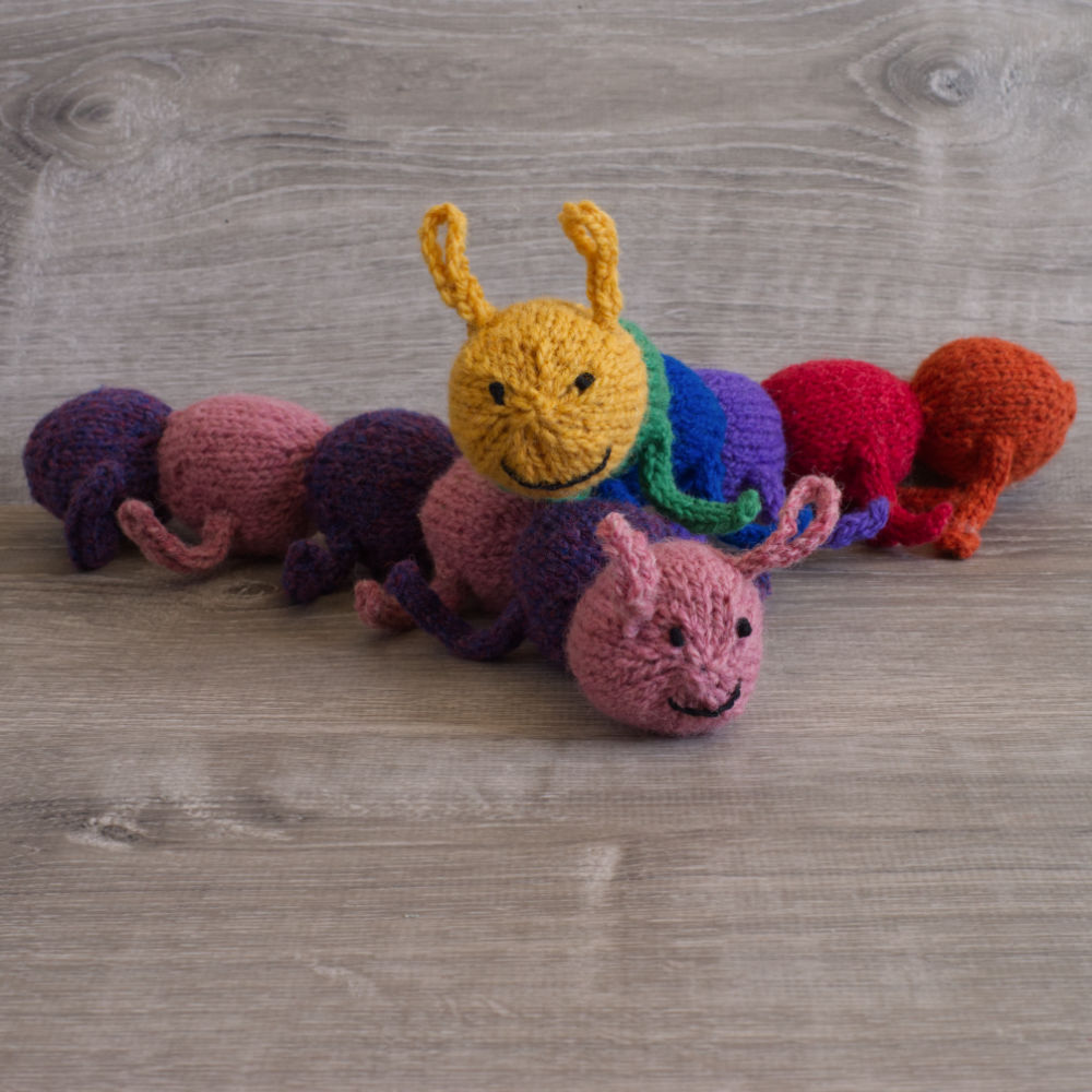 Topsy Farms' handmade rainbow wool caterpillar stuffie