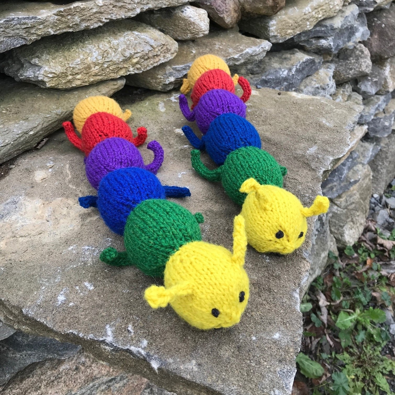 Topsy Farms' handmade rainbow wool caterpillar stuffie