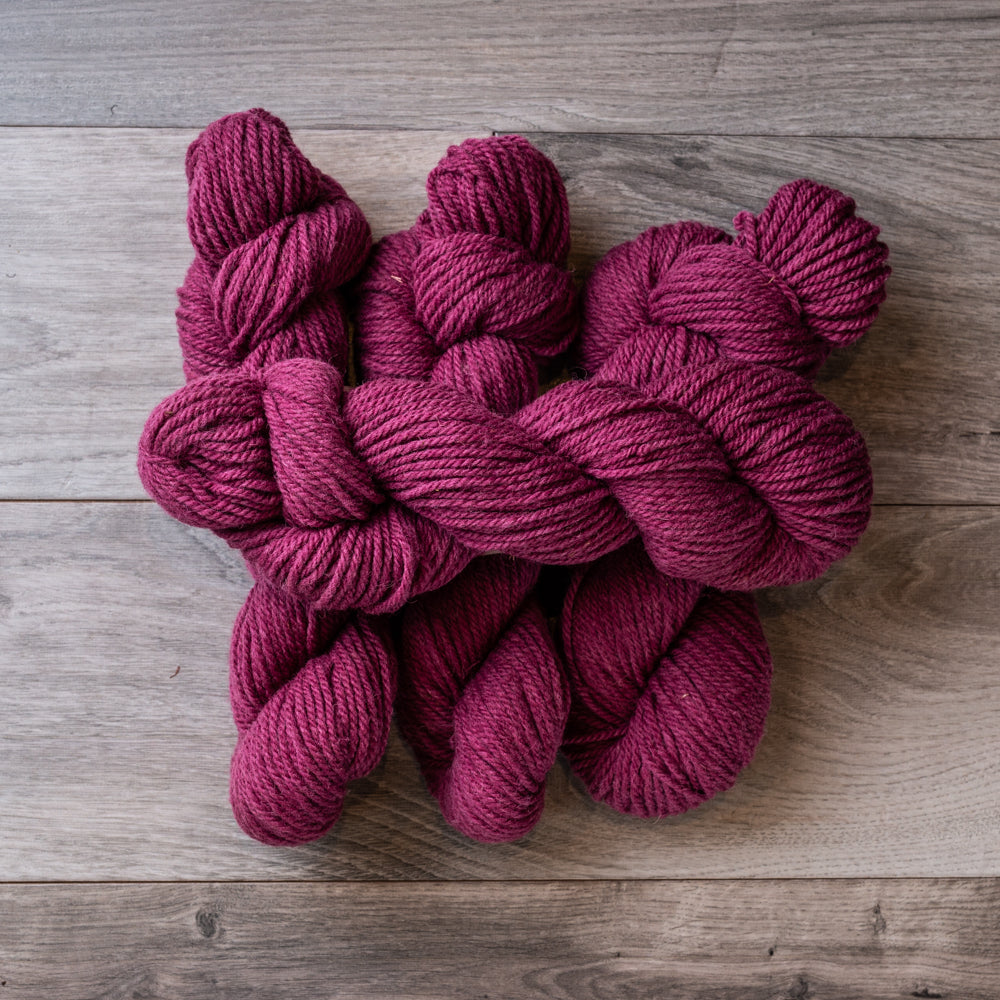 Fuchsia skeins of yarn.