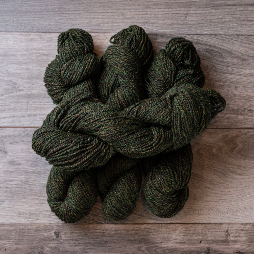 Green Heather skeins of yarn.