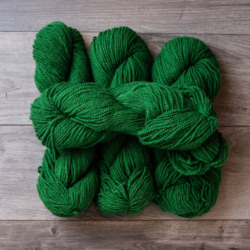 Green Kelly skeins of yarn.