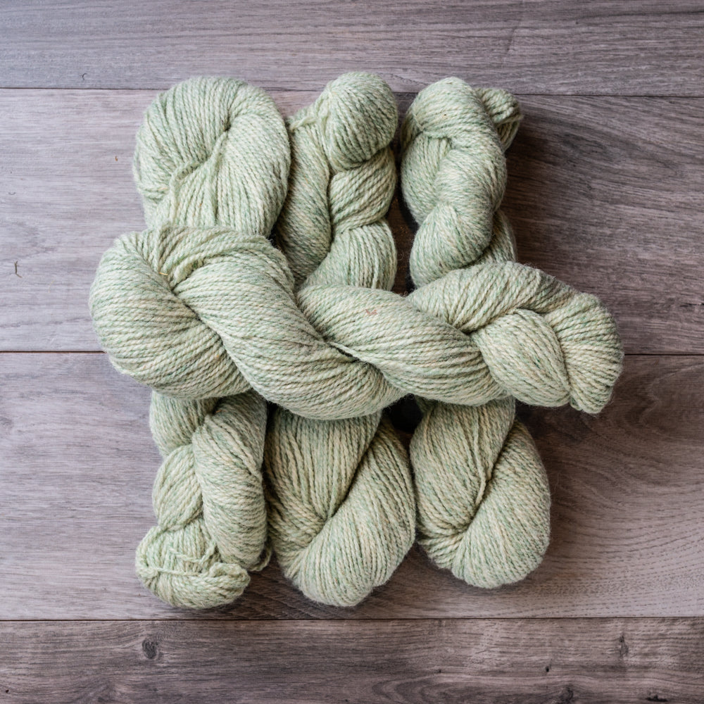 Green Tweed skeins of yarn.