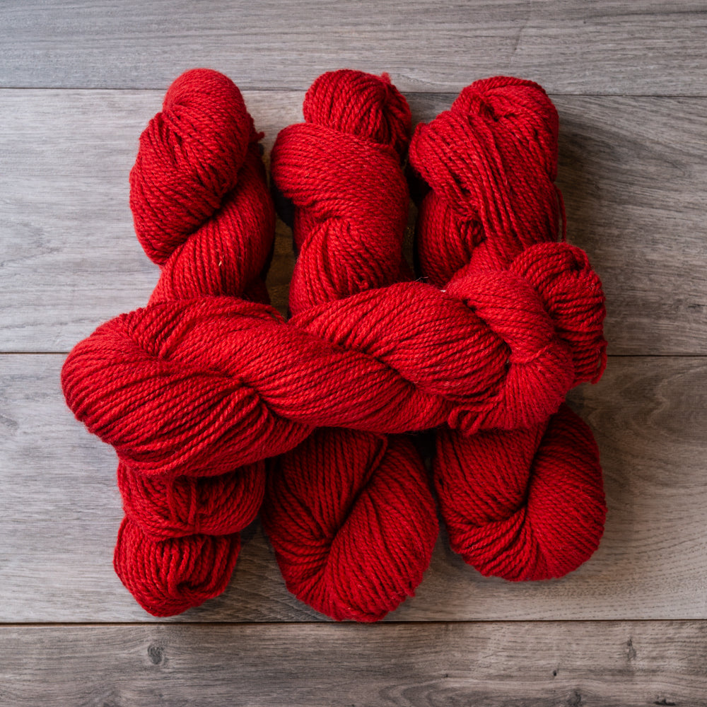 Red skeins of yarn.