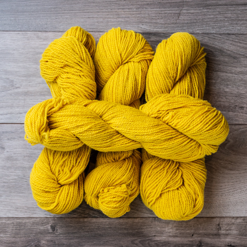 Yellow skeins of yarn.